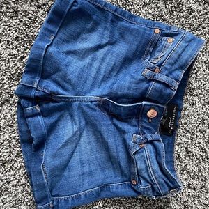 Medium blue kids jean shorts.